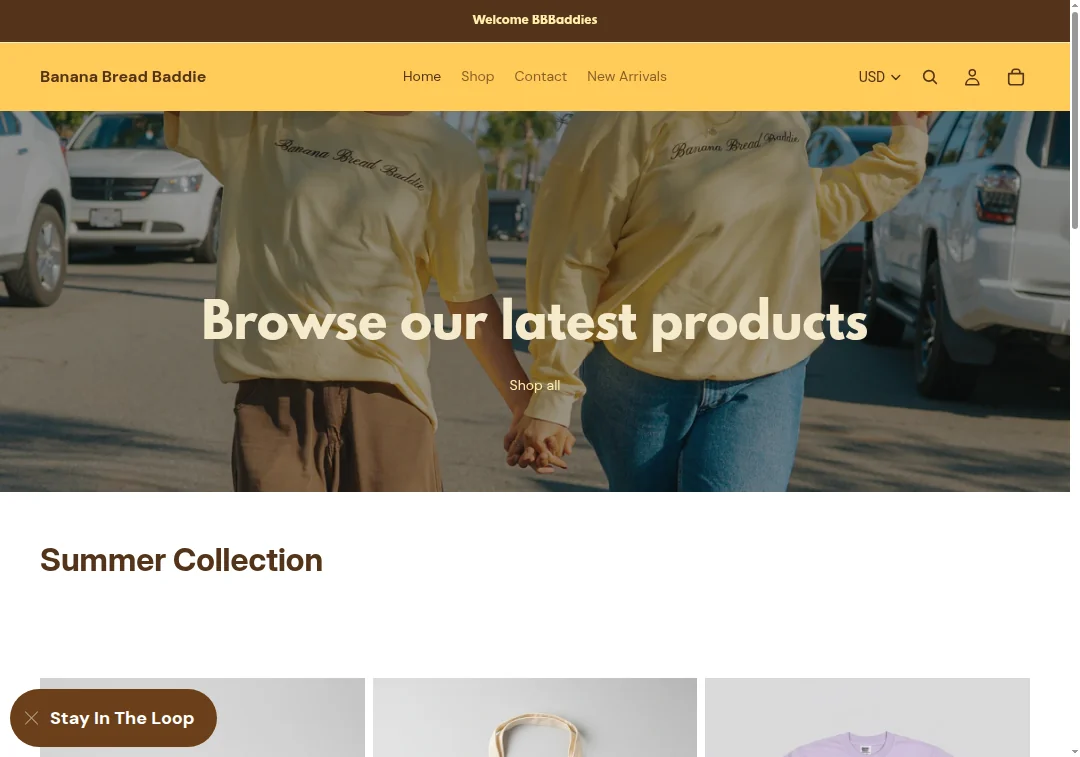 Screenshot of thebananabreadbaddie.com homepage showing baking-themed products